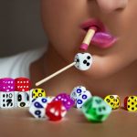 Blowing on Dice while playing craps